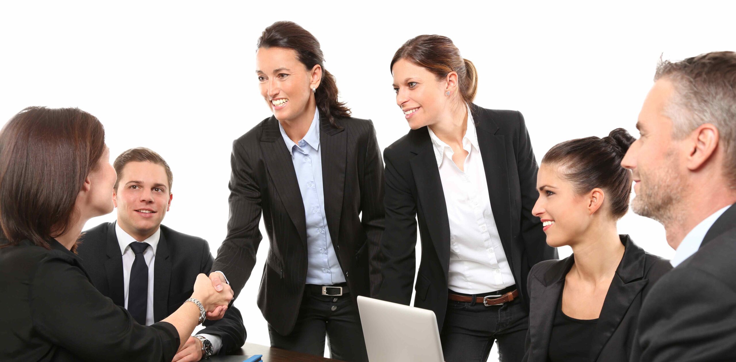 Business people working together with a laptop